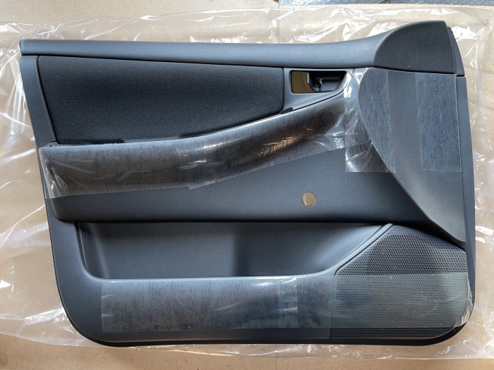 Обшивка двери передней левой TOYOTA Corolla E120 6766013030B1