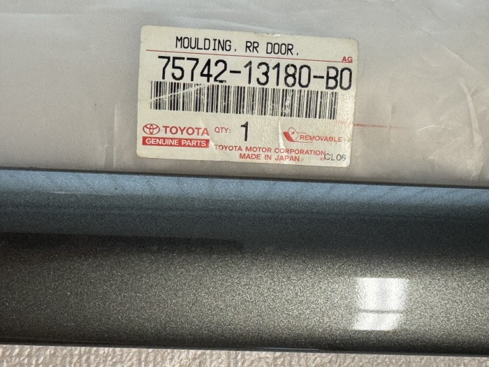 Молдинг задней левой двери TOYOTA COROLLA 120 7574213180B0